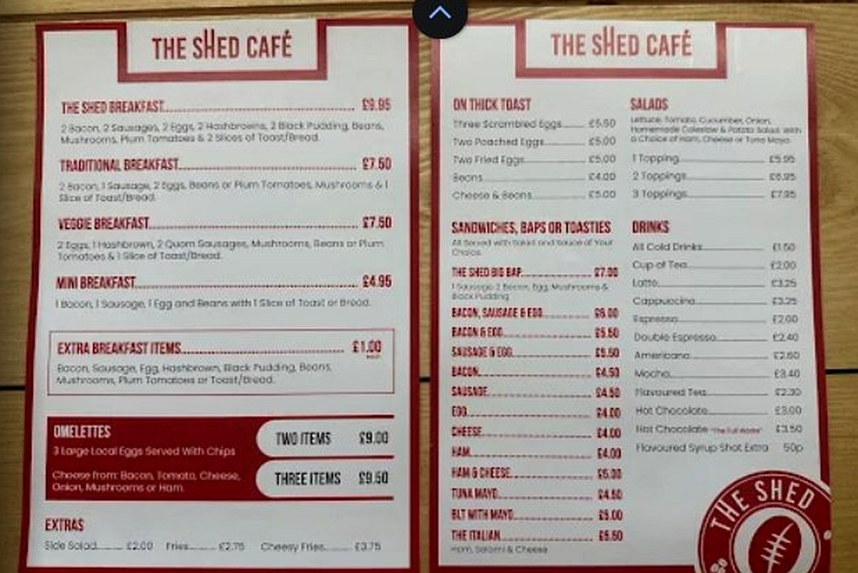 Both menu boards at The Shed Café, including sandwiches, salads and drinks